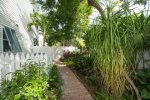 Pool and lush private gardens surround Windsor Townhome 6